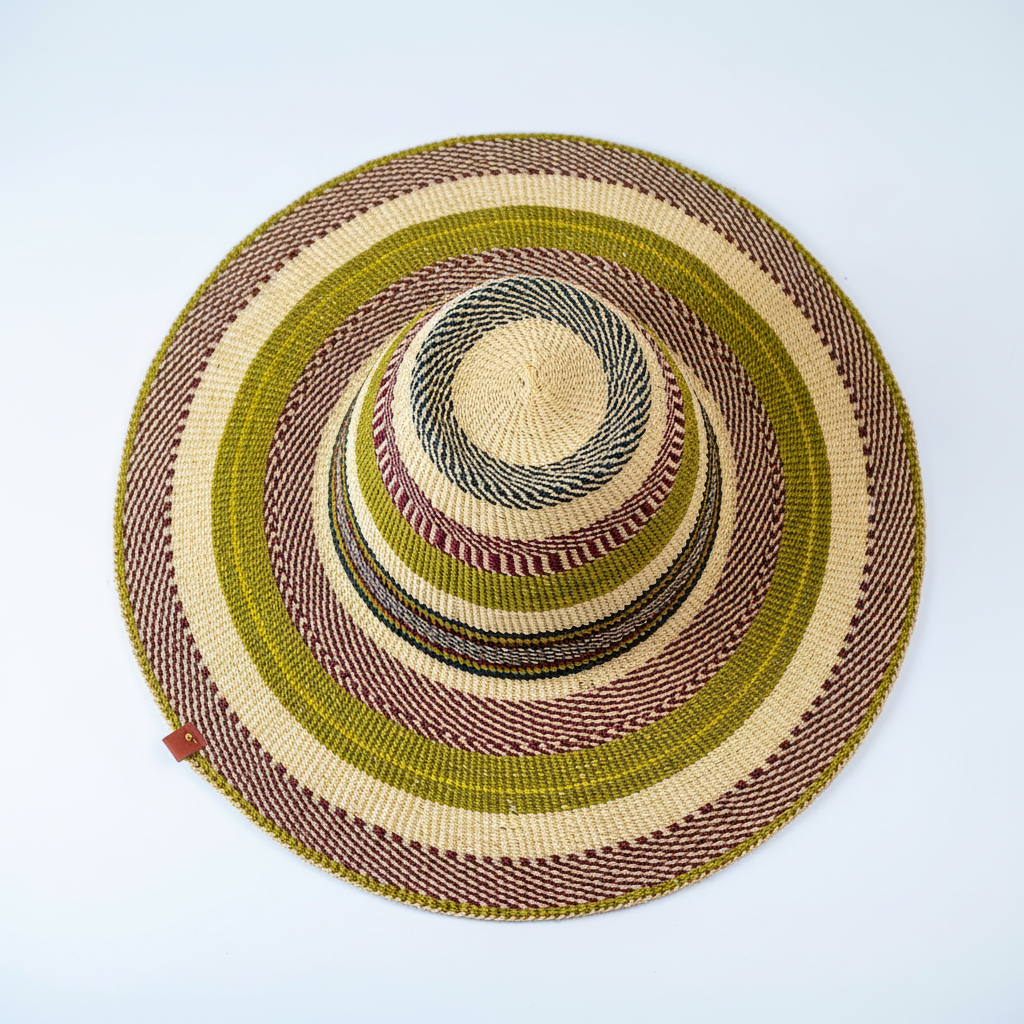 Handwoven Bolga fedora sun hat, top-down view showing spiral crown