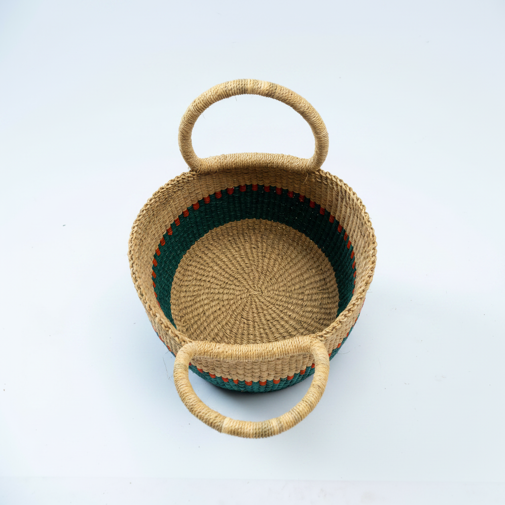 Handwoven teal and natural straw market basket, top-down view