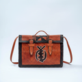 Handmade tan leather satchel, front view
