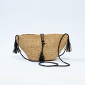 Handwoven straw crescent bag, angled product view