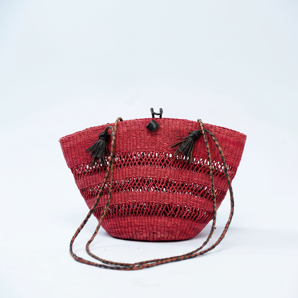 Handwoven crimson red bucket bag, angled view