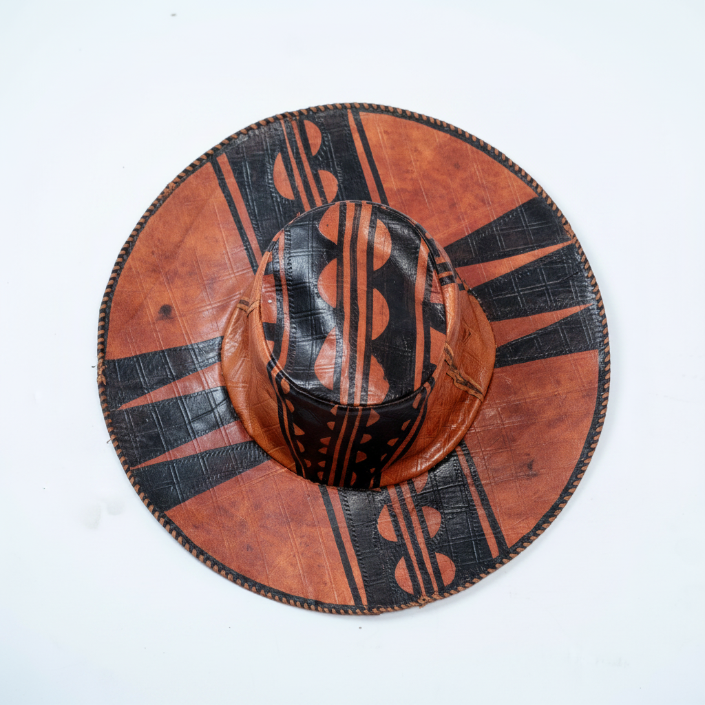 Handmade wide-brim leather hat, top-down view showing crown pattern