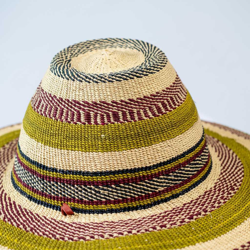 Close-up of olive green and burgundy stripe weave detail on Bolga fedora hat