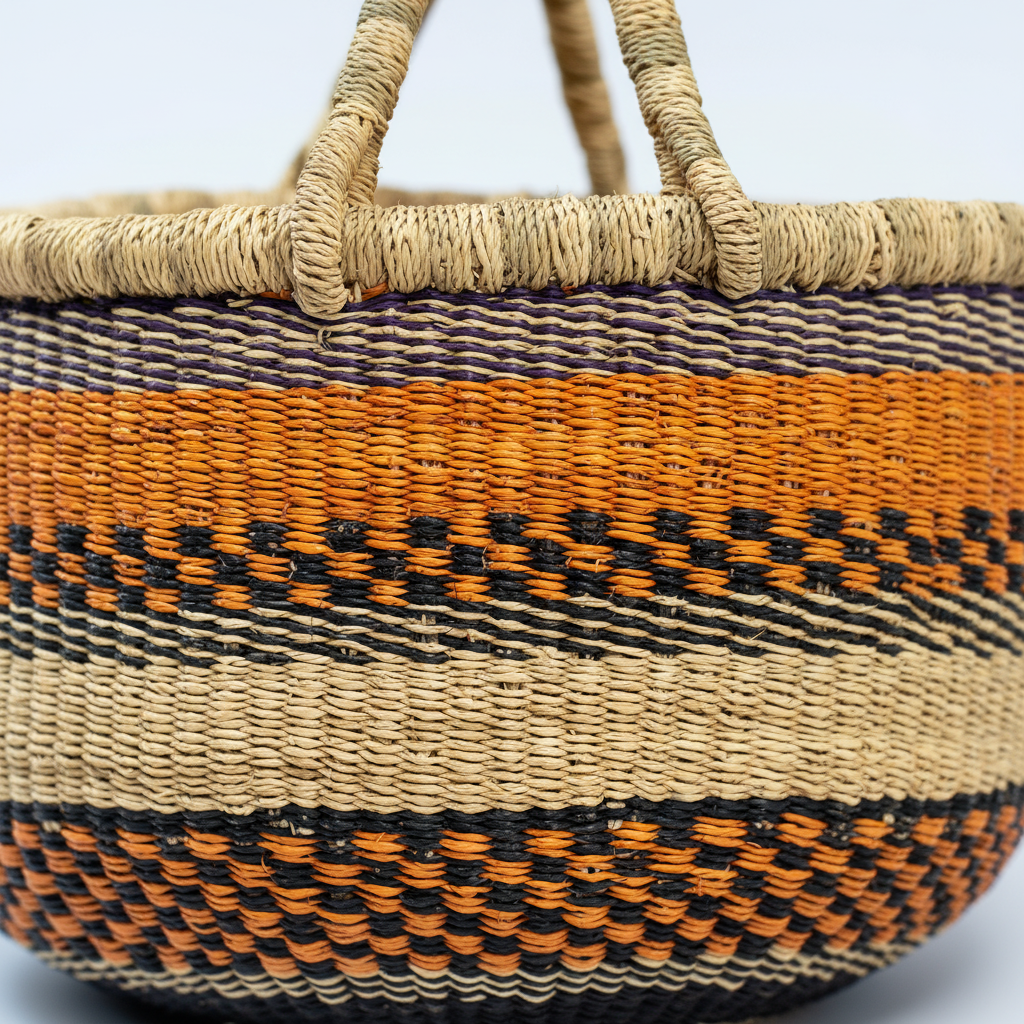 Close-up of orange and black diagonal stripe weave detail
