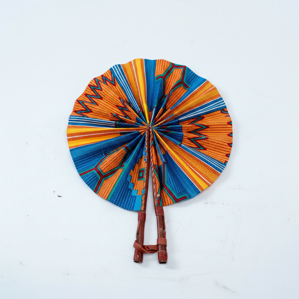 Handmade Ankara circular folding fan partially folded, showing wooden sticks